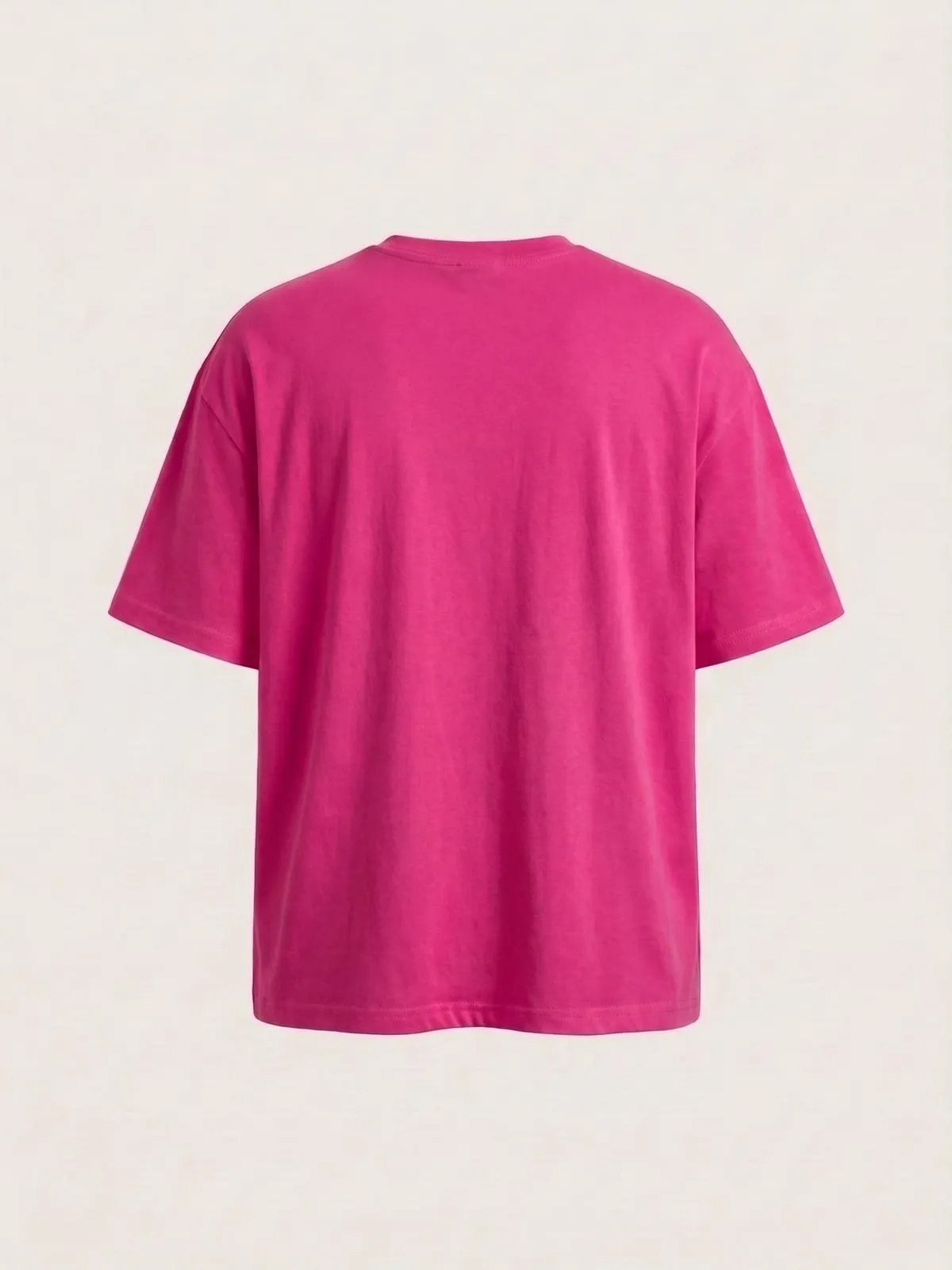 Espalda de la camiseta fucsia de The Vibe, lisa